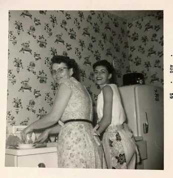 Wearing aprons washing dishes