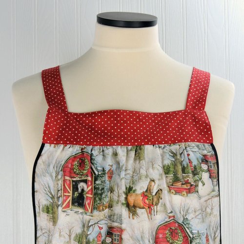Snowy Christmas Barnyard Pinafore with no ties, relaxed fit smock with pockets, red barn, horses, snowman scene, made-to-order XS to 5X