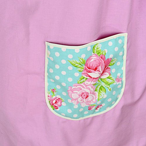 Delightful Pink Pinafore with aqua floral accents, relaxed fit smock with pockets, no tie apron fits L/XL/2X, ready to ship now