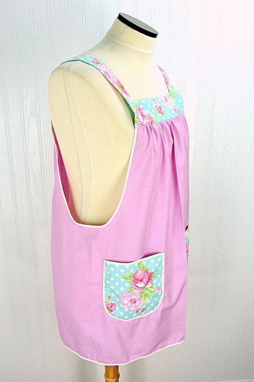 Delightful Pink Pinafore with aqua floral accents, relaxed fit smock with pockets, no tie apron fits L/XL/2X, ready to ship now